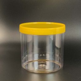 Round container with yellow lid